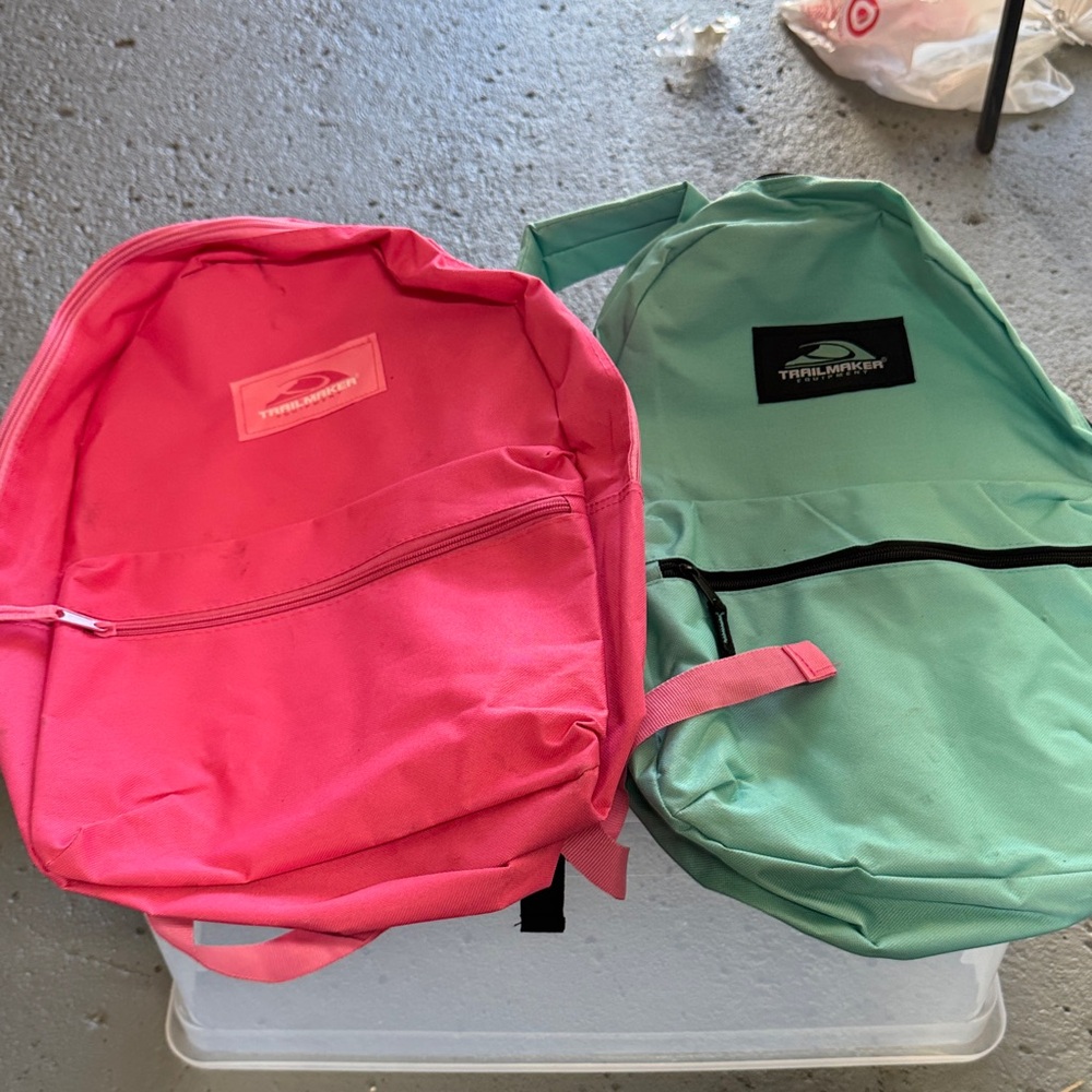 Not used pack of 2 Trail Maker Pink and Green Backpacks